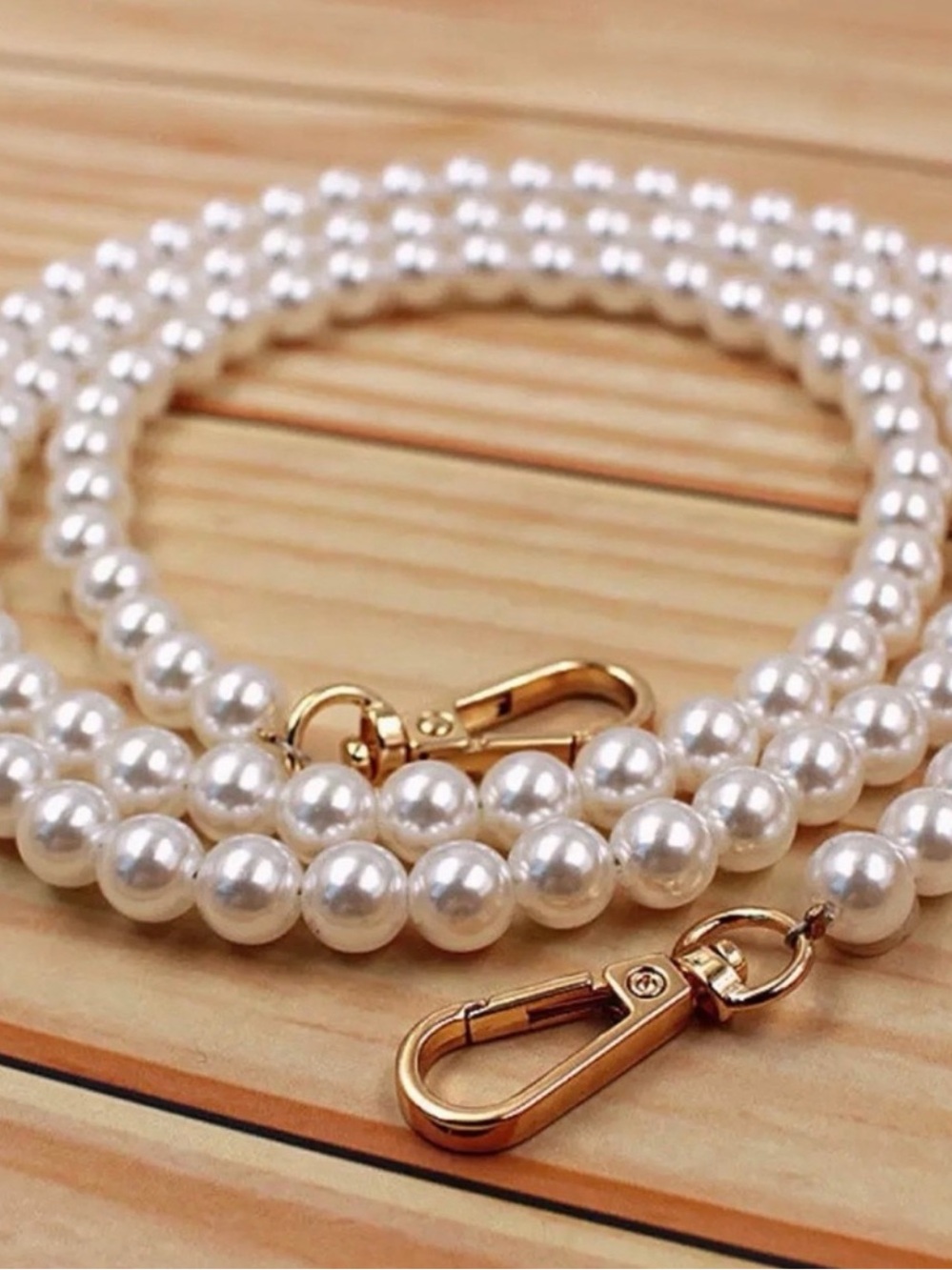 Elegant White Pearl Strap with Gold Hardware